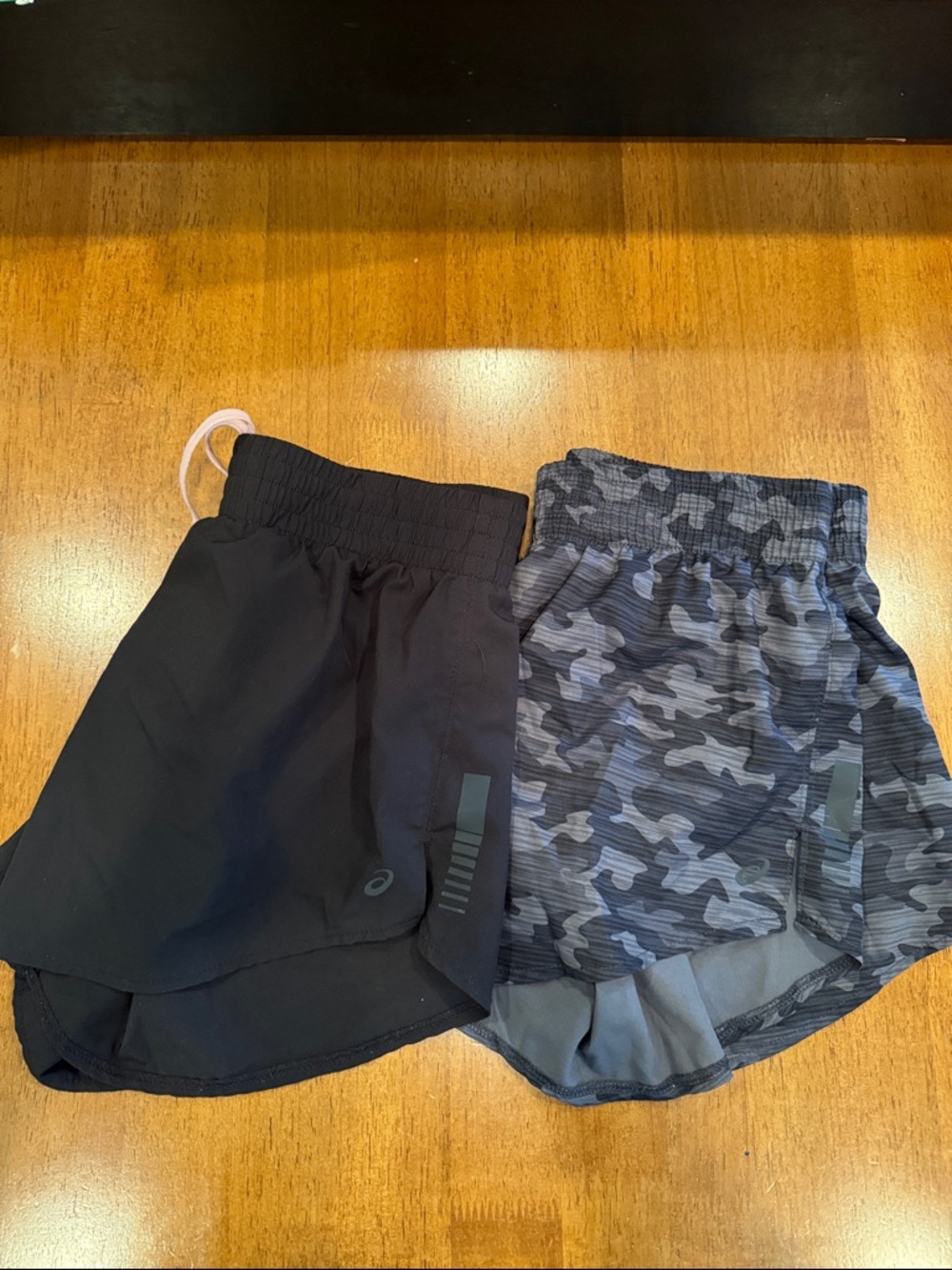 Asics Women’s Black & Gray Camo Athletic Shorts - two pair
